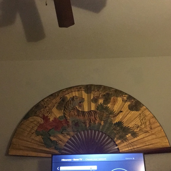 Antique fan  Folds just like a fan as well .